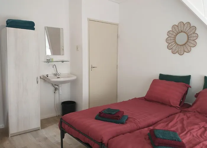 Alojamento de Acomodação e Pequeno-almoço Voorstraat-straatzicht Boven *